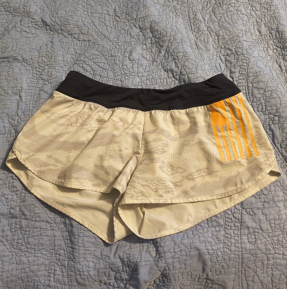 Reebok CrossFit White and Black Athletic Shorts with Orange Accent
